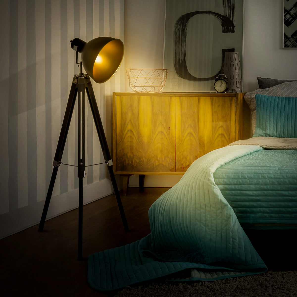 Tripod Floor Lamp lit in a living room