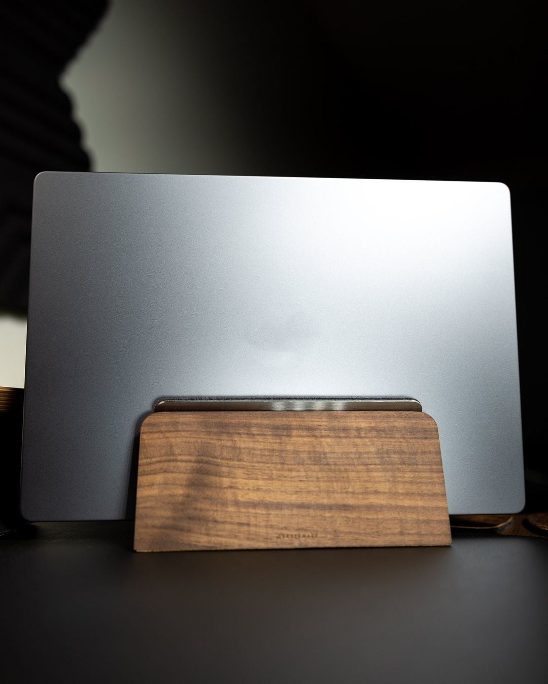Solid Walnut Laptop Stand holding a laptop